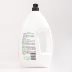 RECAMIER shampoo label close-up highlighting vegan formula and paraben-free care.