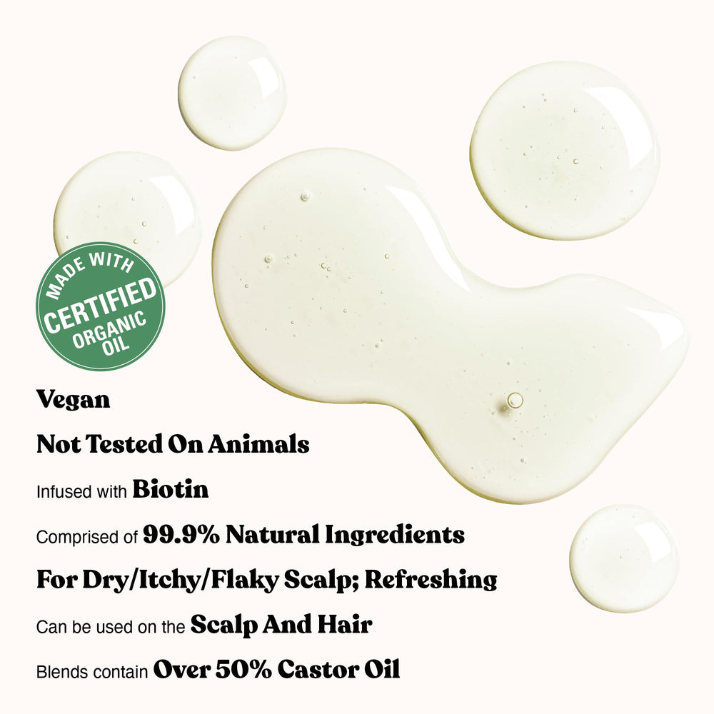 Red by Kiss Biotin-infused oil being applied to hair for nourishment.