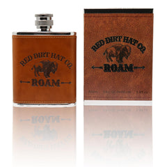Red Dirt Hat Company Roam Cologne bottle closeup highlights rugged leather scent for daily confidence.