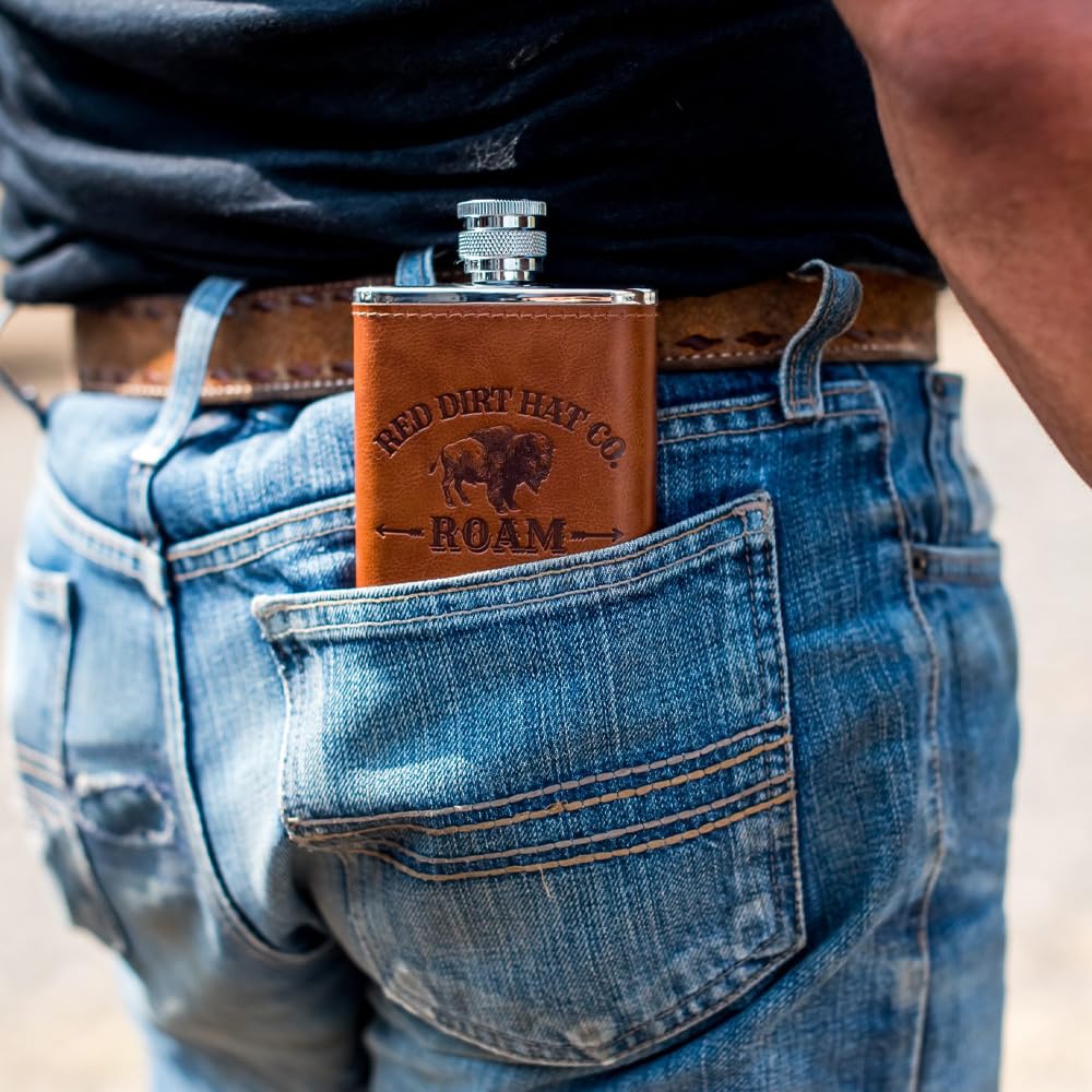 Red Dirt Hat Company Roam Cologne packaging display suggests versatile fragrance for work and evenings.