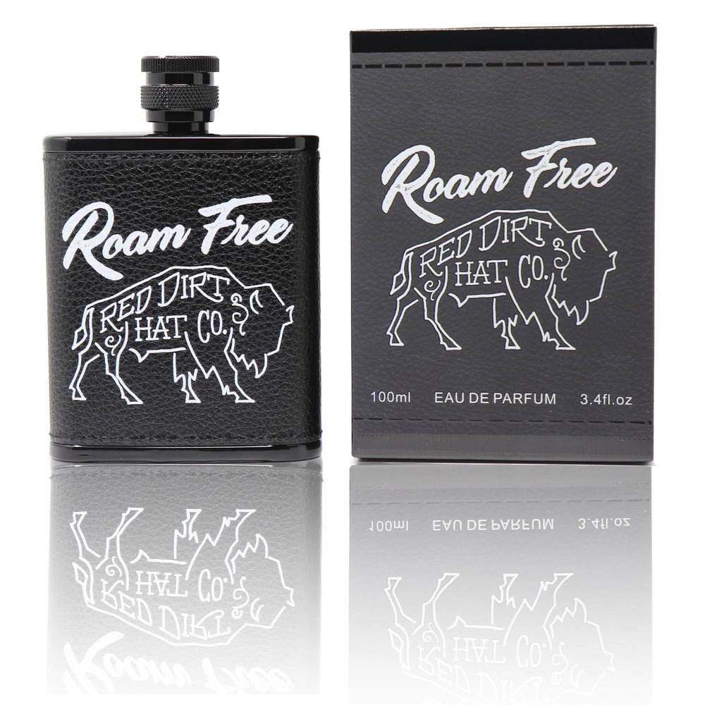 Red Dirt Hat Company Roam Free bottle front with citrus notes for daily wear
