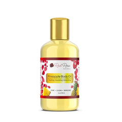 Red Rose Naturals Pineapple Body Oil bottle close-up showing tropical fragrance for daily hydration.