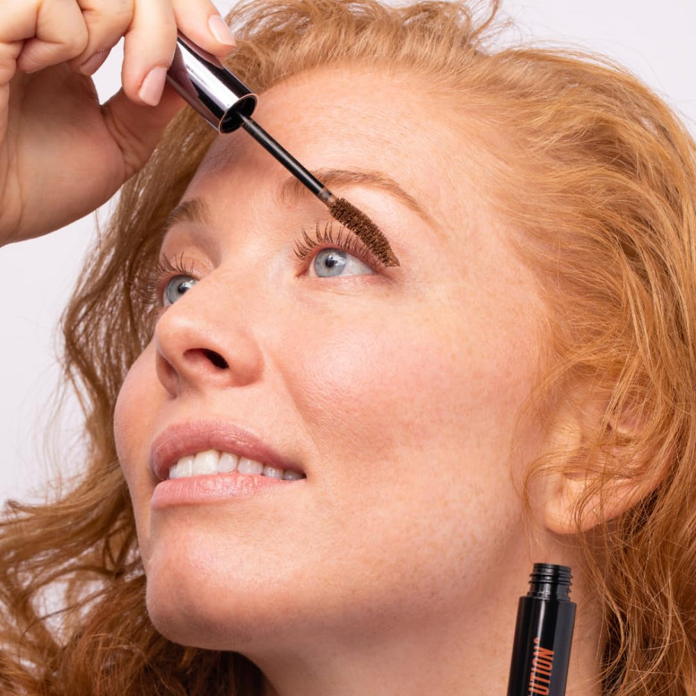 Redhead Revolution Gingerlash lashes closeup with volumized, defined lashes and reddish-brown tint.
