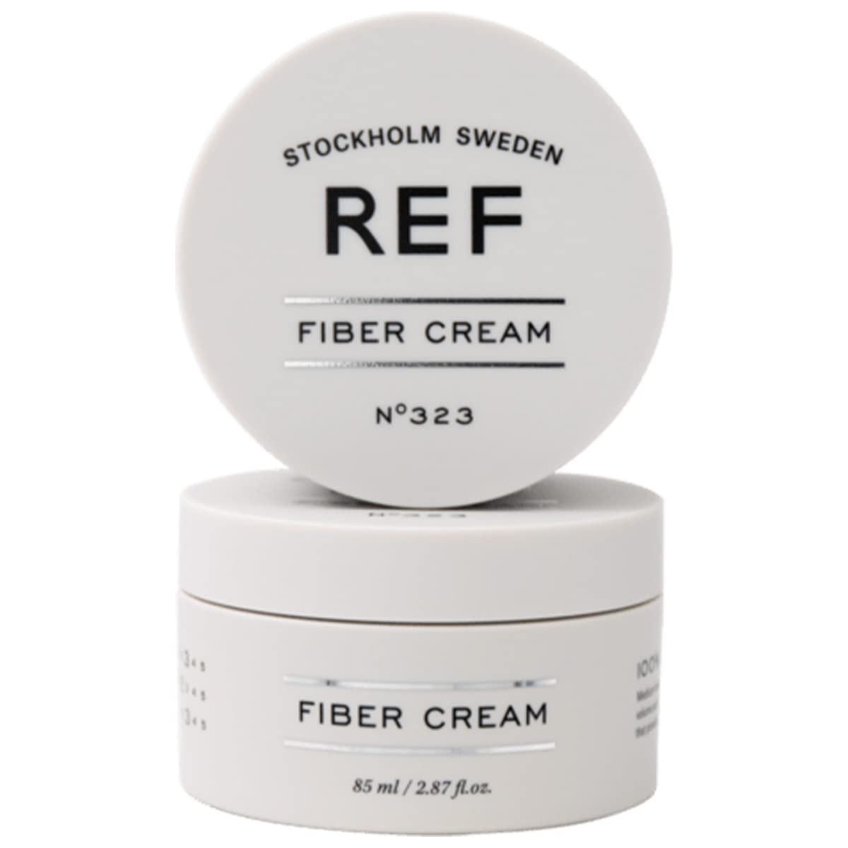 REF FIBER CREAM N°323 bottle close-up showing creamy texture ideal for smoothing routine