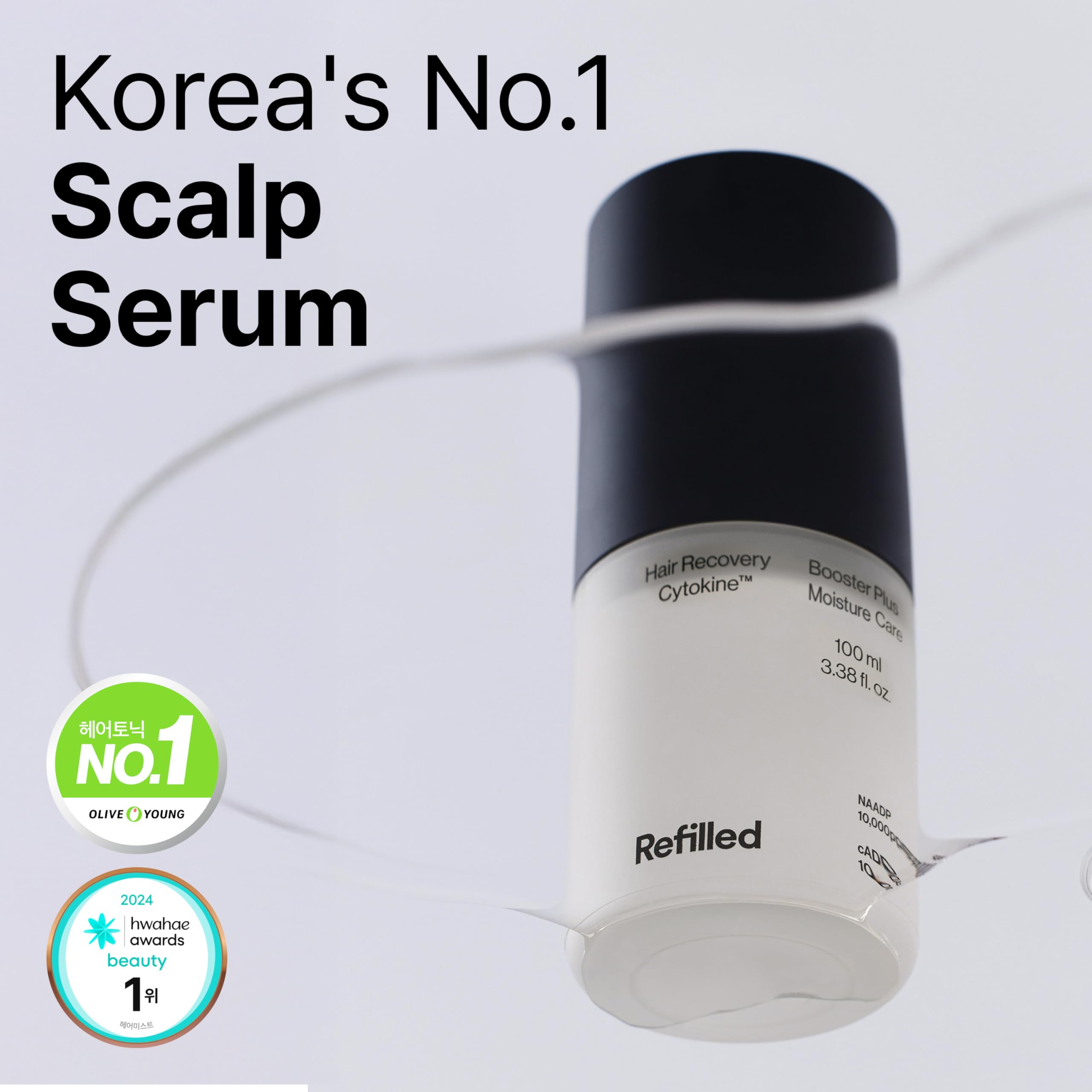 Refilled Booster Plus Moisture applying on scalp for even distribution.