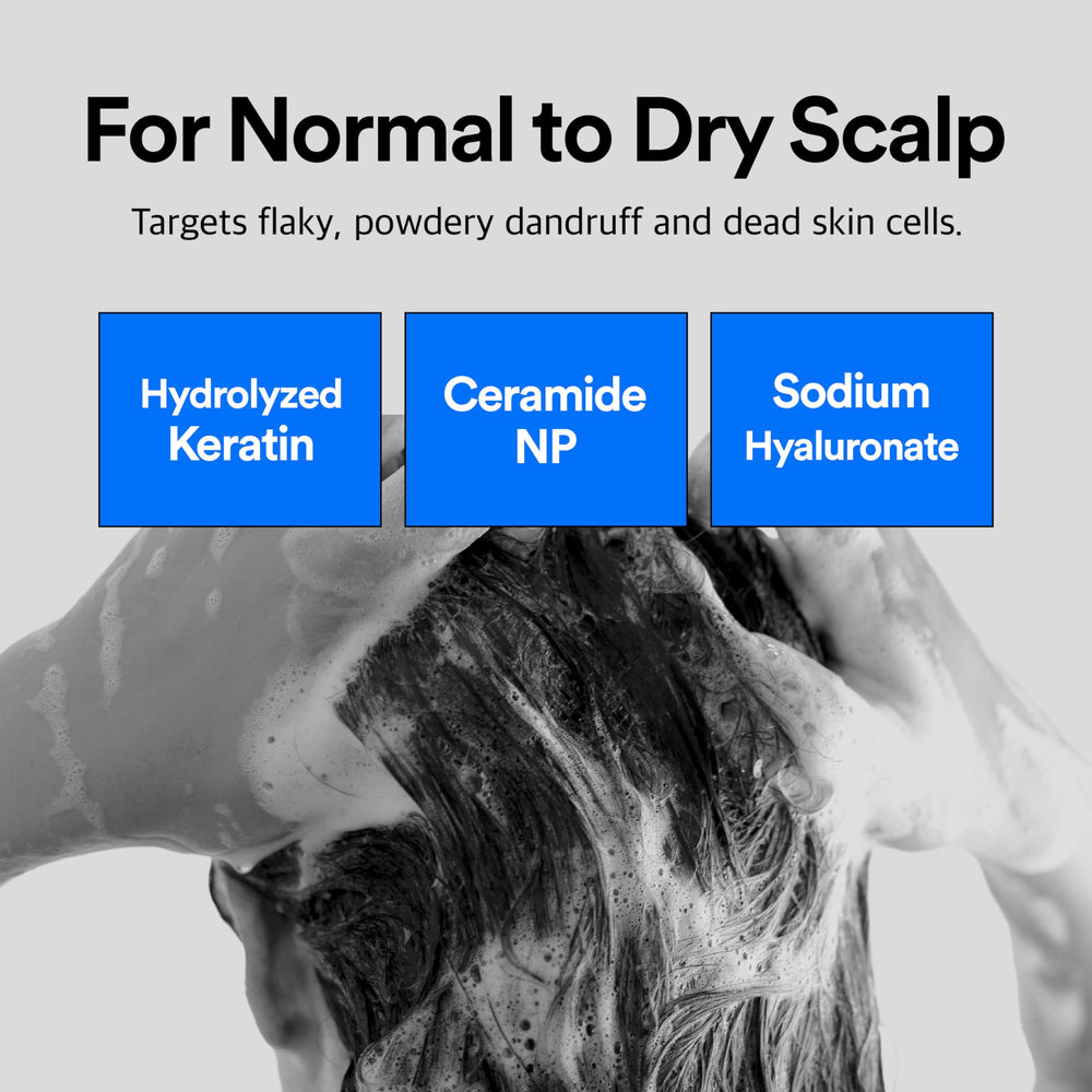 Refilled shampoo bottle with visible label and hydrating keratin and ceramide benefits.