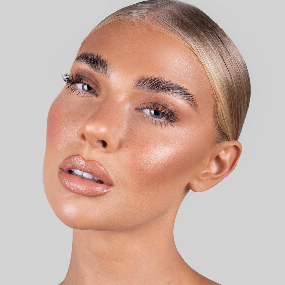 REFY Brow Sculpt wax-gel hybrid texture applied on brow hairs for control.