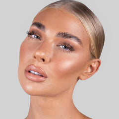 REFY Brow Sculpt wax-gel hybrid texture applied on brow hairs for control.