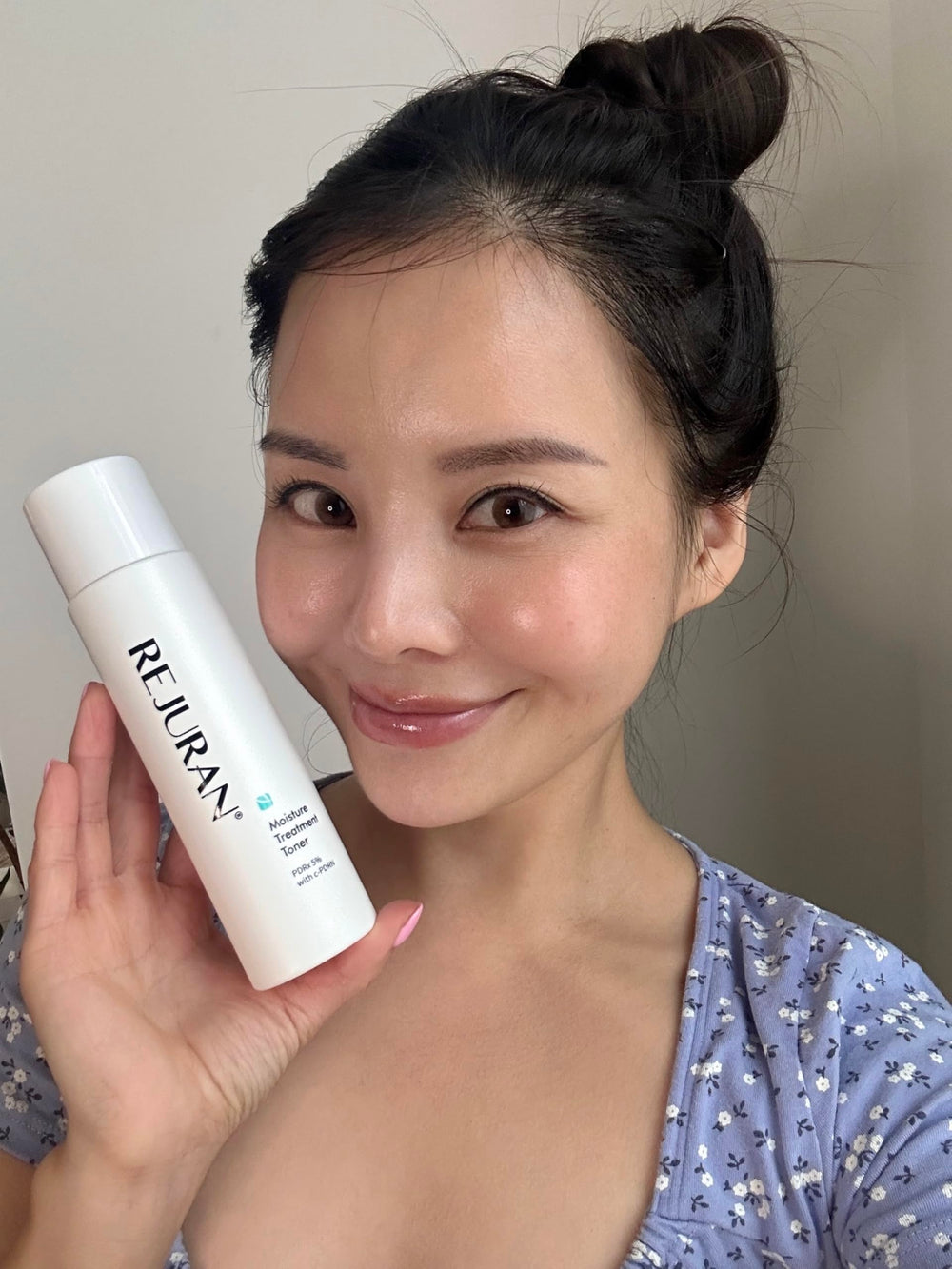 REJURAN Moisture Toner glow after use suggests refreshed hydrated skin.