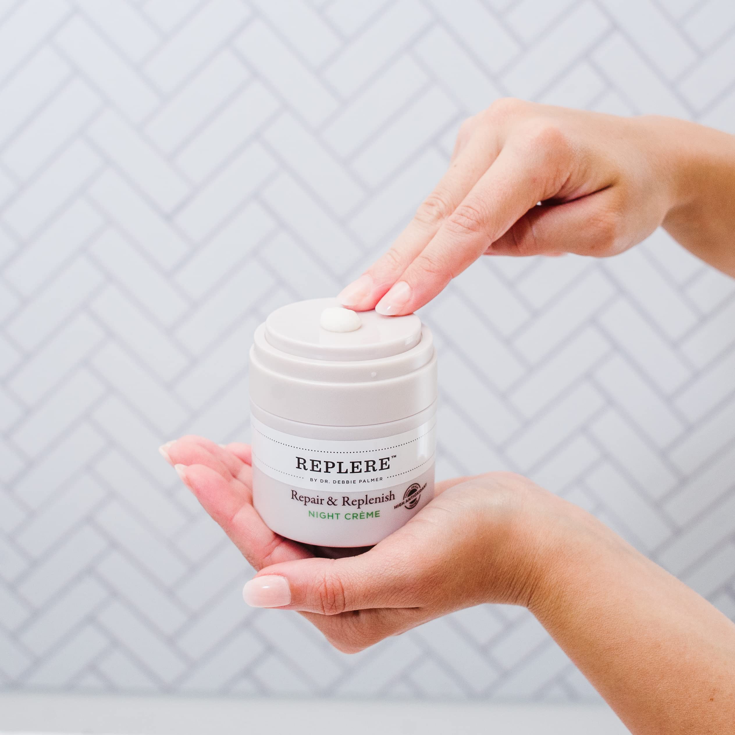 Replere Repair & Replenish jar application highlights nourishing cream for fine lines