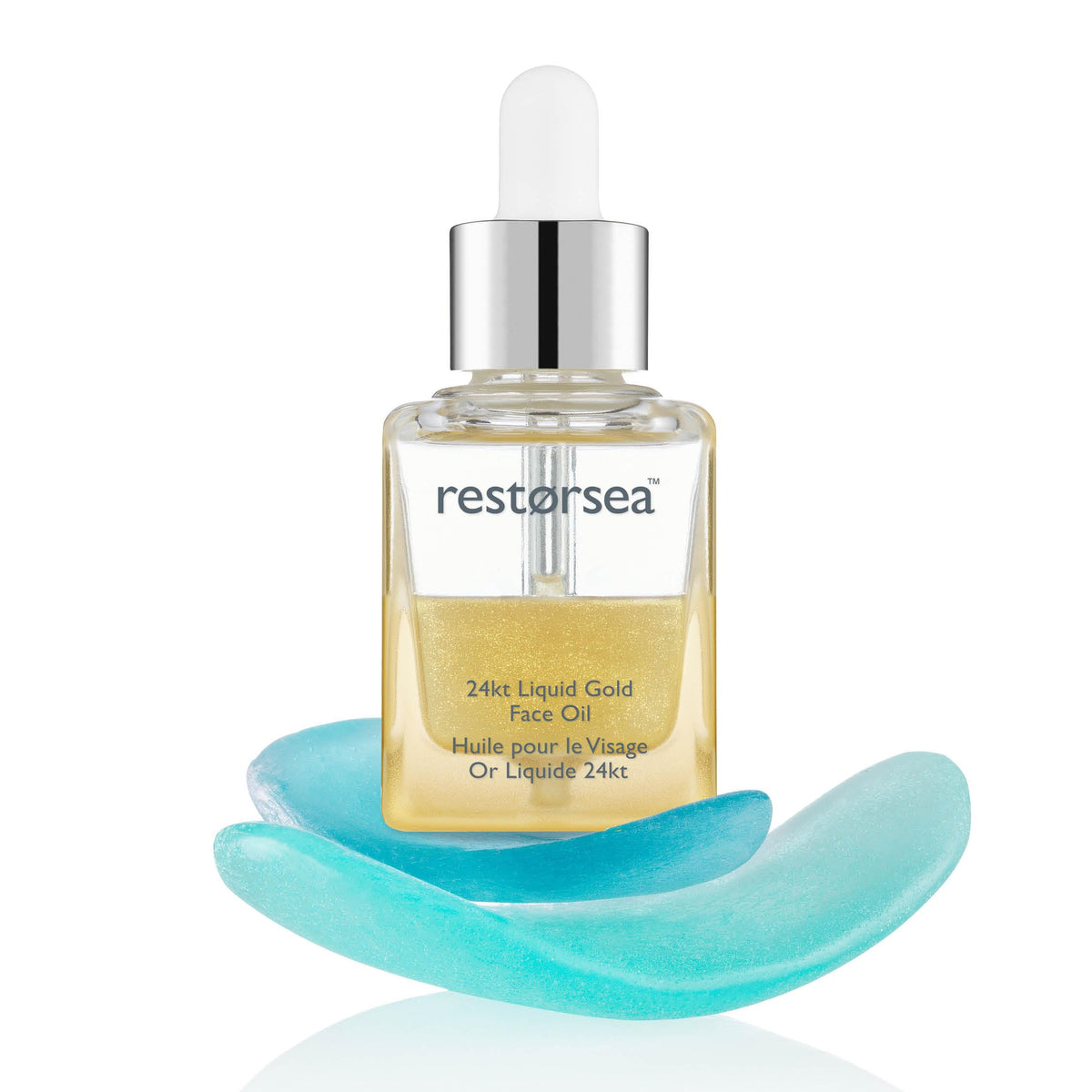 Restorsea 24kt liquid gold face oil bottle close-up balancing sebum while hydrating skin.