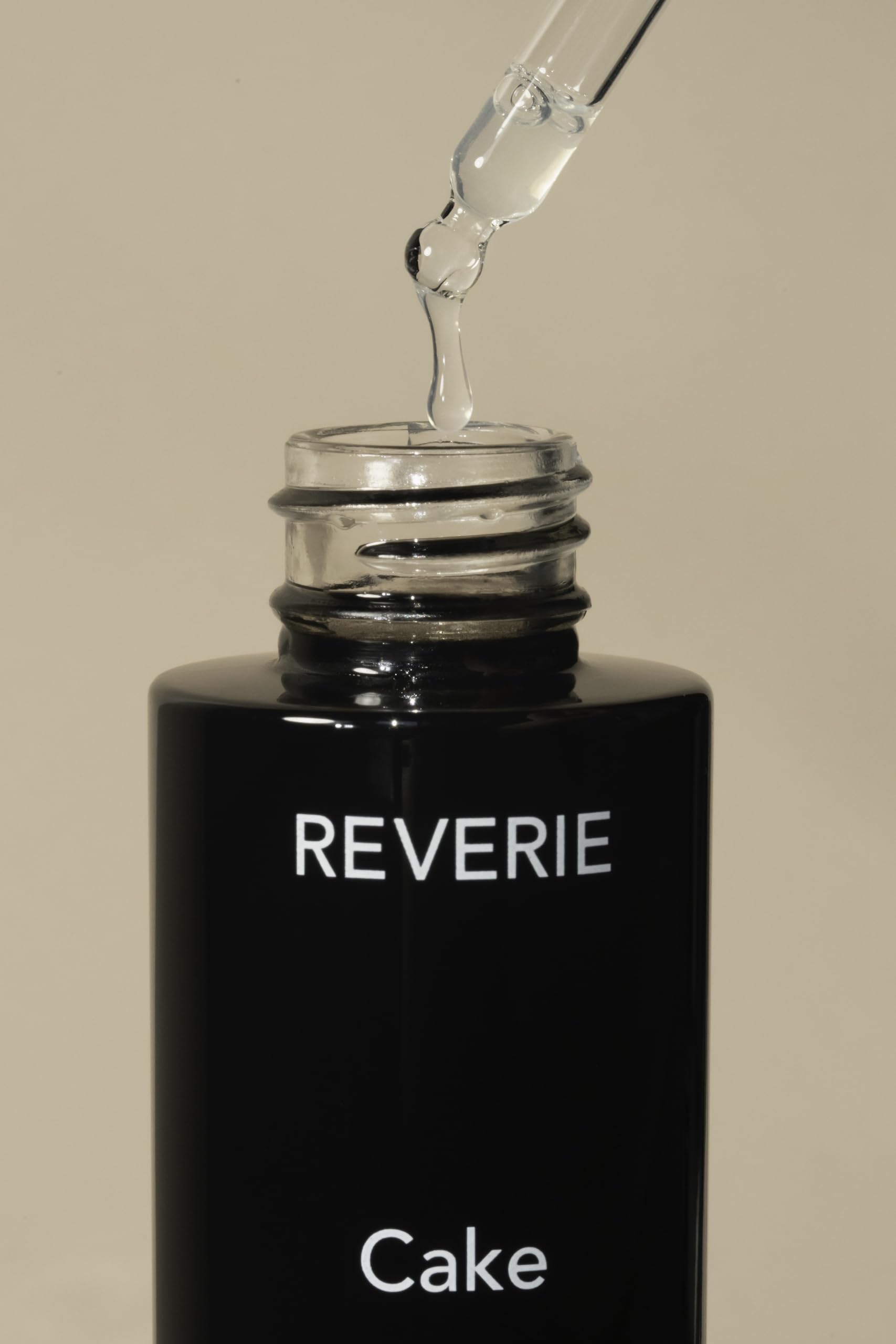 REVERIE Cake Restorative Scalp Tonic dropper application enabling precise scalp nourishment
