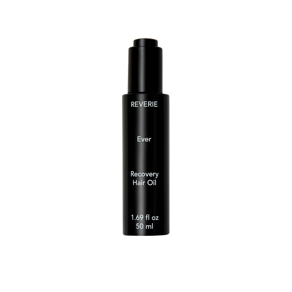 REVERIE Ever Recovery Oil bottle pour shows silky moisture for frizz control