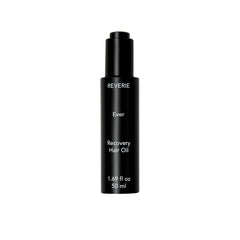 REVERIE Ever Recovery Oil bottle pour shows silky moisture for frizz control