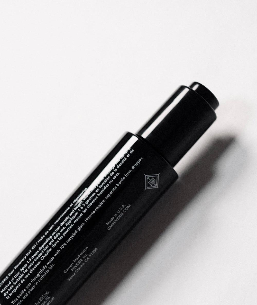 REVERIE Ever Recovery Oil on damp strands enhances elasticity and reduces breakage