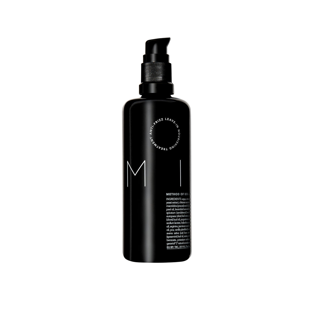REVERIE Natural Milk anti-frizz bottle closeup shows frizz control.