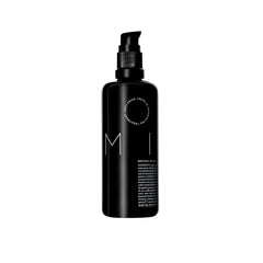 REVERIE Natural Milk anti-frizz bottle closeup shows frizz control.