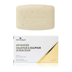 REVITALE Advanced Scrub Bar texture close-up showing gentle exfoliation in action.