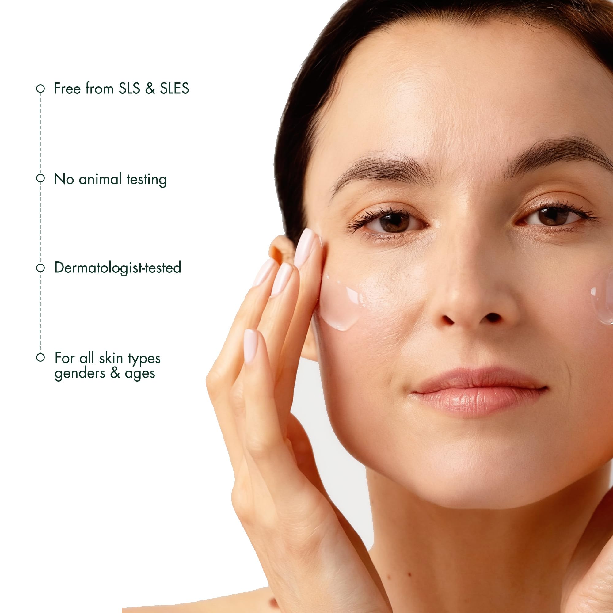 Applying RéVive Balancing Toner to the face for prep and calm skin.