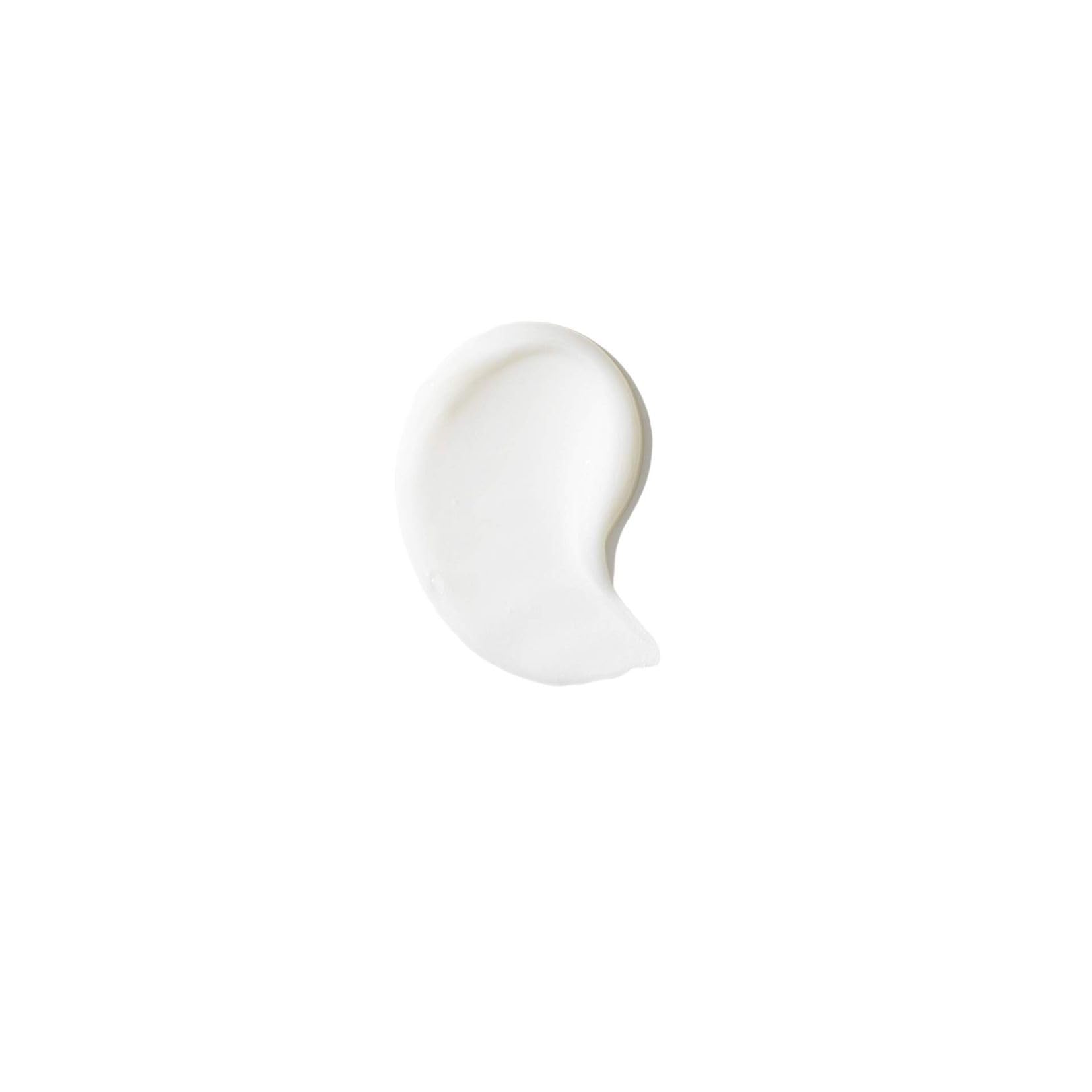 RéVive cleanser texture closeup shows creamy lather for gentle cleansing.