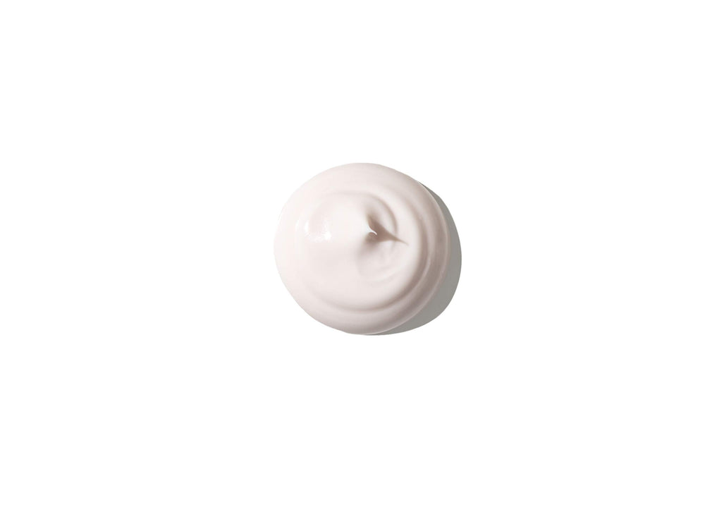 Application of RéVive hand cream with SPF 15 shows rose-scented formula absorbing smoothly