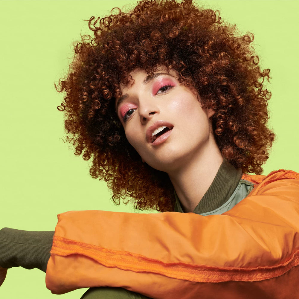 REVLON Professional Pro You Twister Scrunch Gel in hand shows flexible hold and control.
