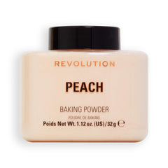 Revolution Beauty London Peach loose baking powder jar closeup shows silky texture and shine control.