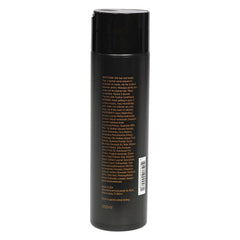 Hands holding Reza Fixation Shampoo show silky, frizz-free texture.