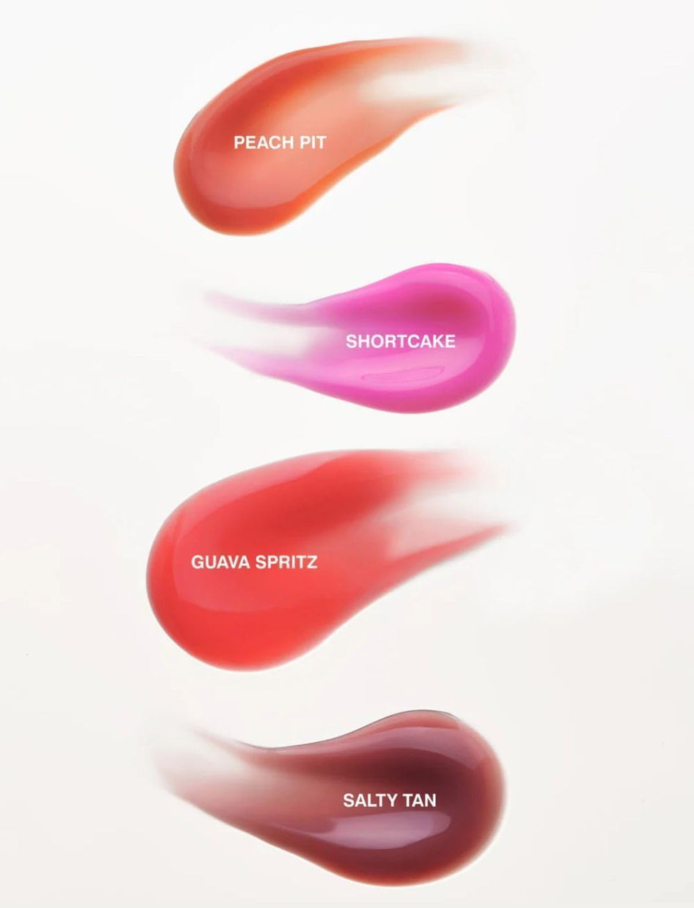 Rhode Gloss Lip Tint in Toast captured in natural light for authentic tone.