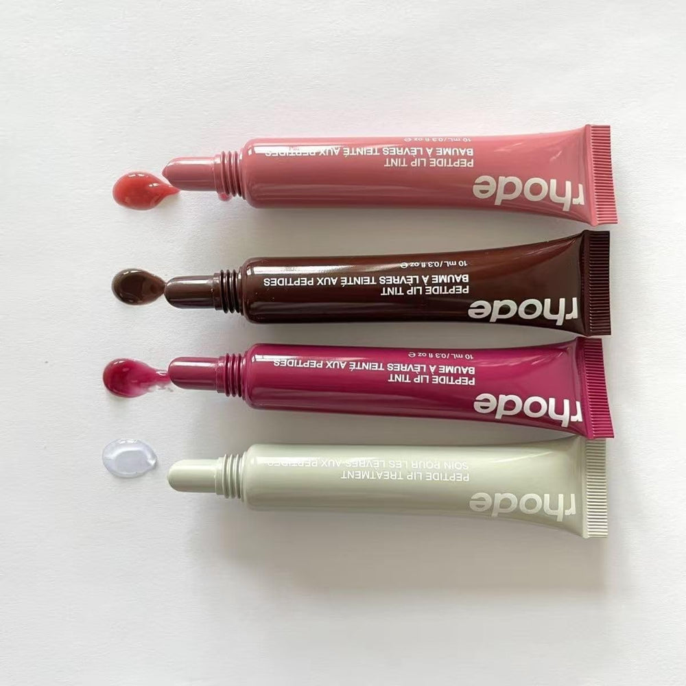 Application with Rhode Gloss Lip Tint wand demonstrating easy, precise use.