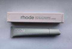 Rhode Hailey Bieber peptide lip treatment Watermelon Slice bottle delivers nourishment and a glossy finish.