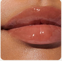 Rhode peptide lip tint in travel size fits on-the-go touch ups.