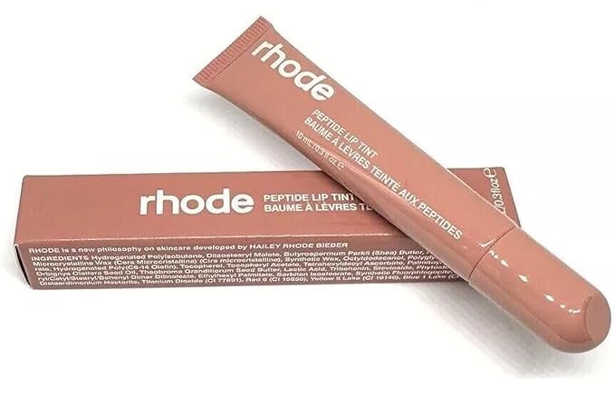 Rhode Peptide Lip Tint glossy swatch shows hydrating, subtle color for everyday lips.