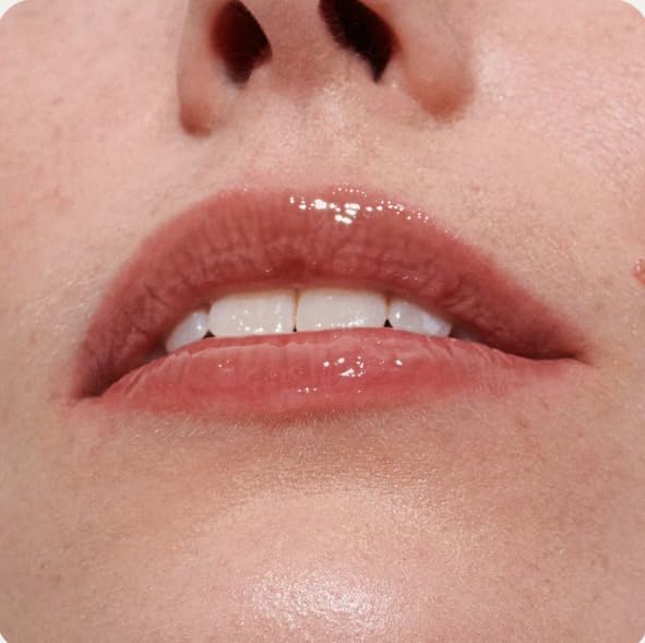 Rhode peptide lip tint showcases a natural, plumped look without heaviness.