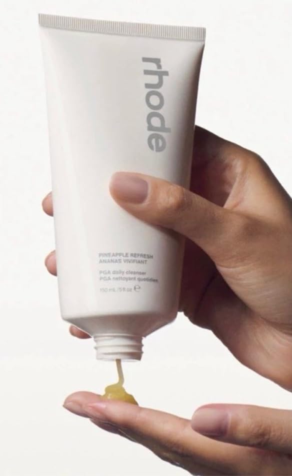 Rhode Pineapple Refresh Daily Cleanser lather close-up showing creamy texture for gentle daily use.