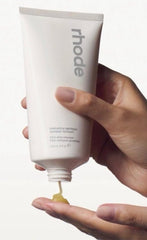 Rhode Pineapple Refresh Daily Cleanser lather close-up showing creamy texture for gentle daily use.