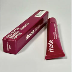 Rhode Raspberry Lip Tint tube delivering raspberry flush with daily hydration.