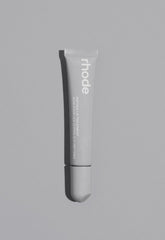 Rhode Unscented Lip Treatment bottle with cushion applicator for daily hydration and gloss