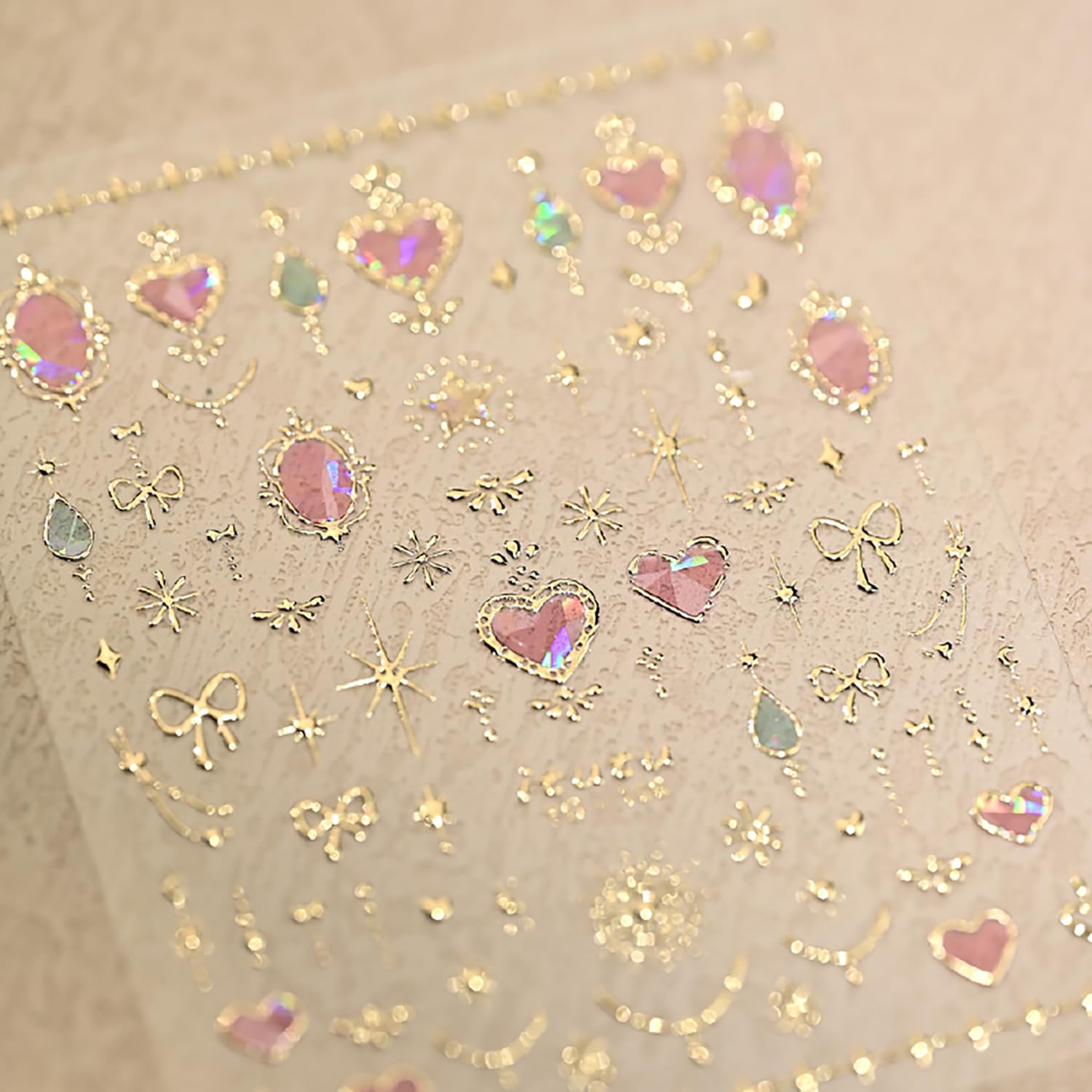 Rhspayh nail stickers featuring gold bow and star accents for elegant detail.