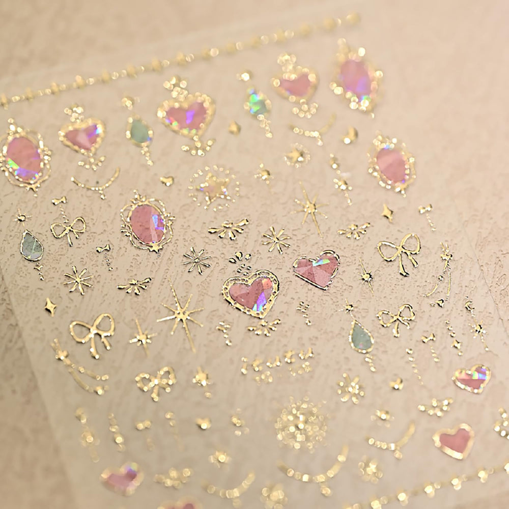 Rhspayh nail stickers featuring gold bow and star accents for elegant detail.