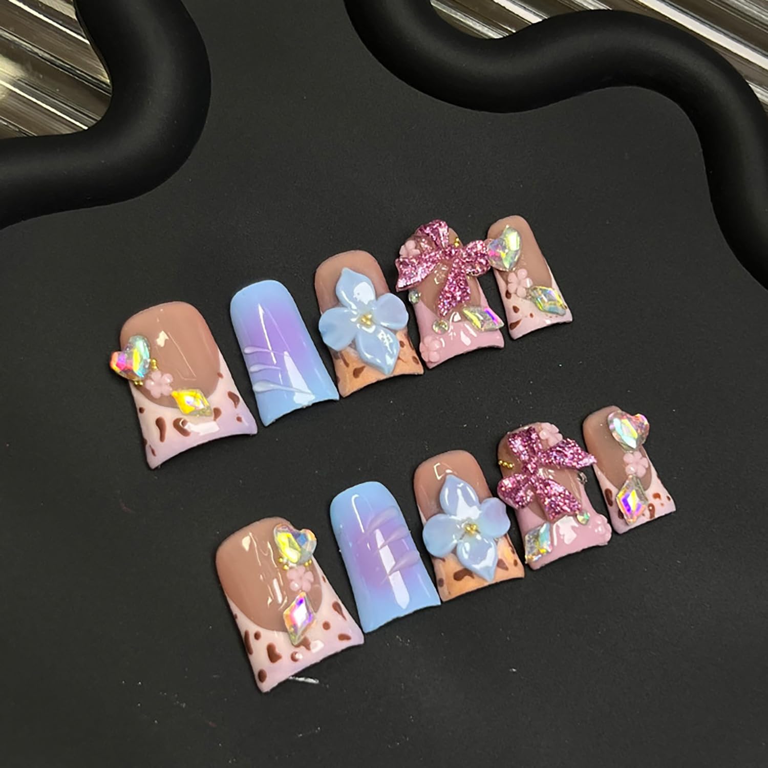 RIICFDD Duck blue flower press-on nails for easy at-home manicures.