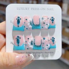 RIICFDD handmade nails with 3D blue rhinestones for a salon-style finish at home