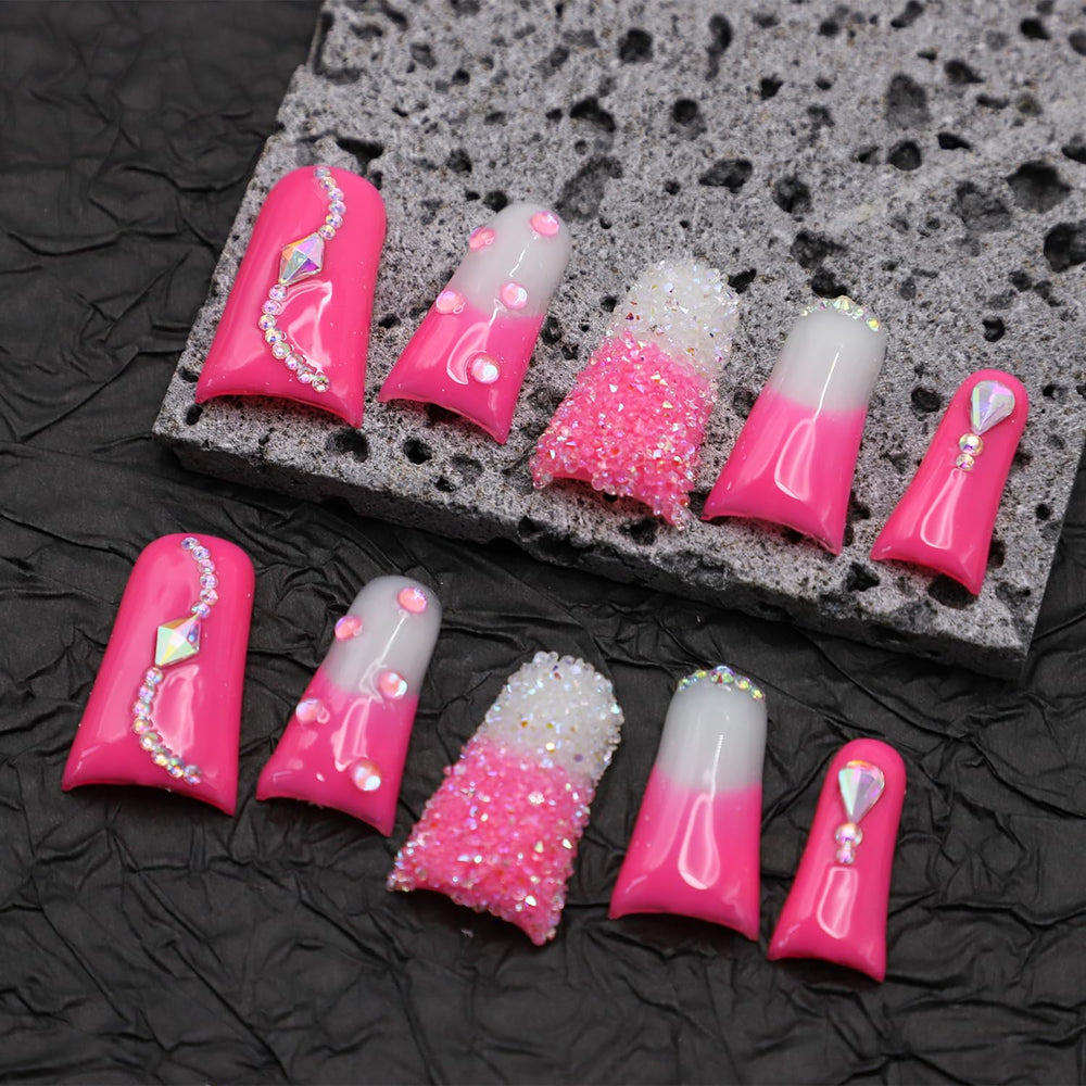 RIICFDD rose-pink nails with rhinestones add sparkle for special occasions