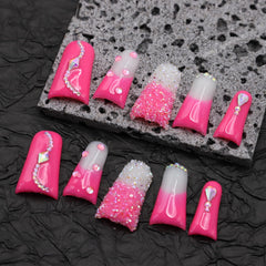 RIICFDD rose-pink nails with rhinestones add sparkle for special occasions