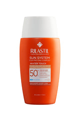 Rilastil Sun System Water Touch bottle closeup showing light, blendable finish
