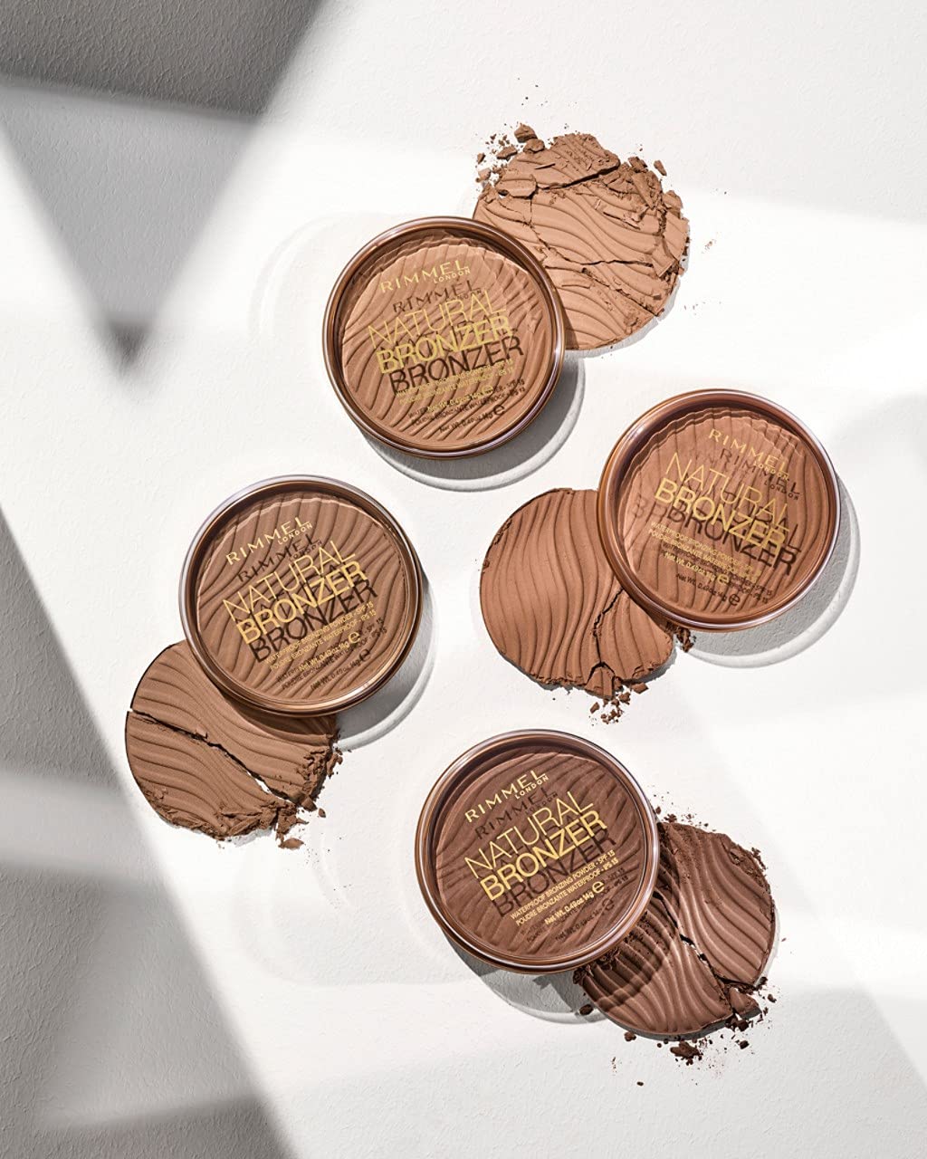 Rimmel London Natural Sun Light bronzer packaging close-up highlights sleek design