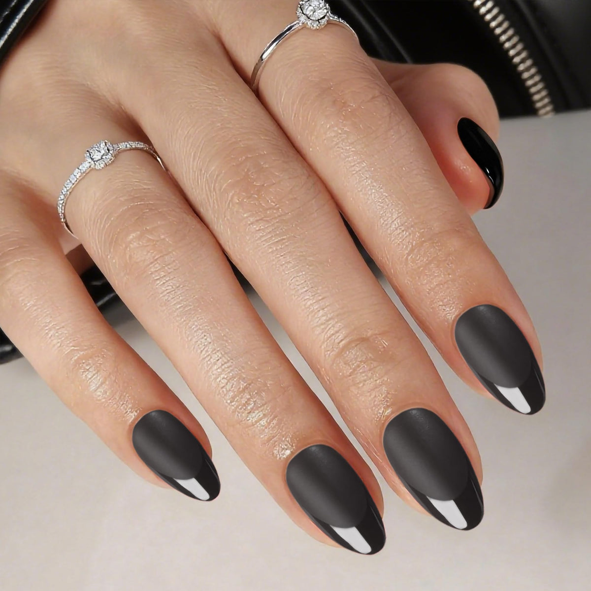 Rimudecure almond matte black press-on nails with glossy tips for an at-home chic manicure