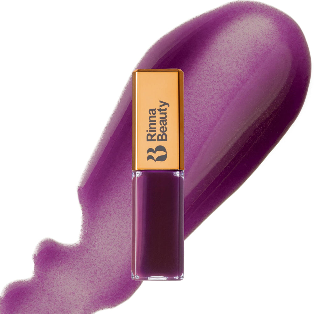 Rinna Beauty Royalty lip oil bottle for hydrating glossy shine.