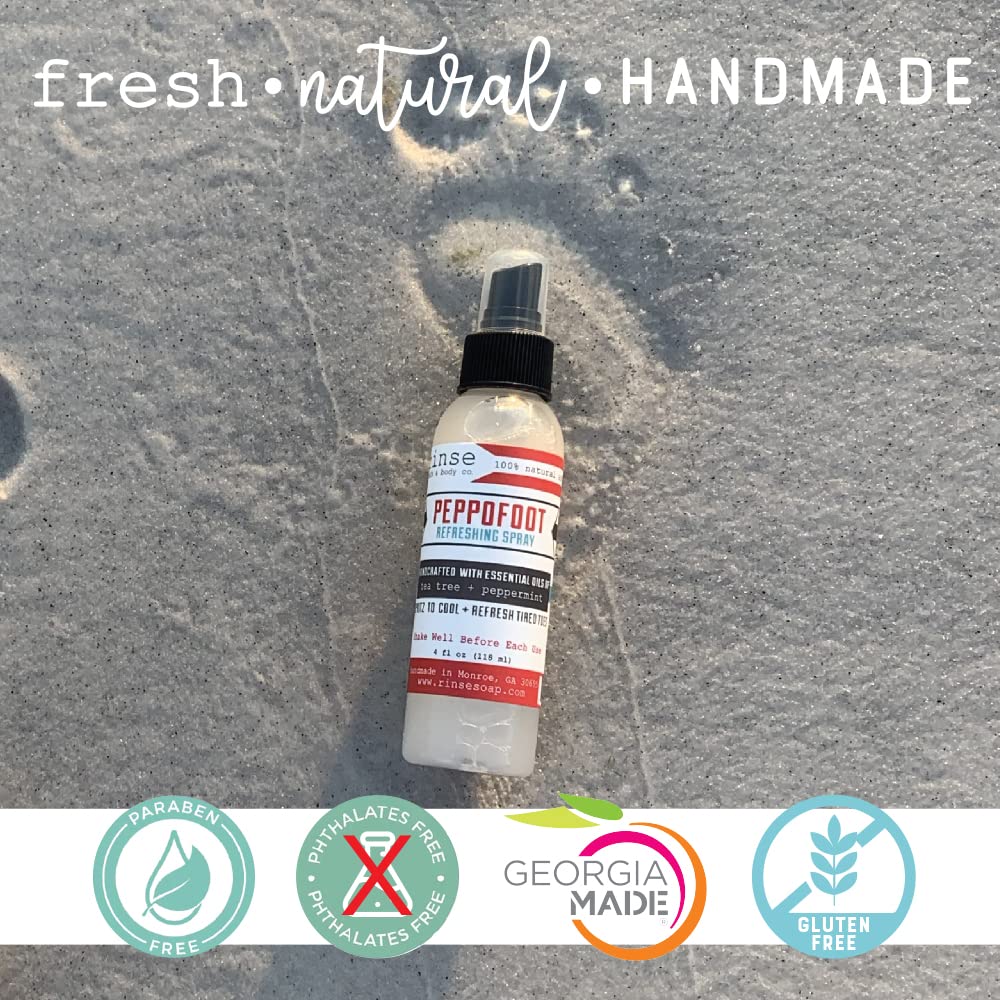 Rinse Bath & Body peppermint tea tree blend is shown in close-up for refreshing foot care.