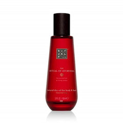 RITUALS The Ritual of Ayurveda Dry Oil VATA bottle pouring smoothly for quick body and hair application
